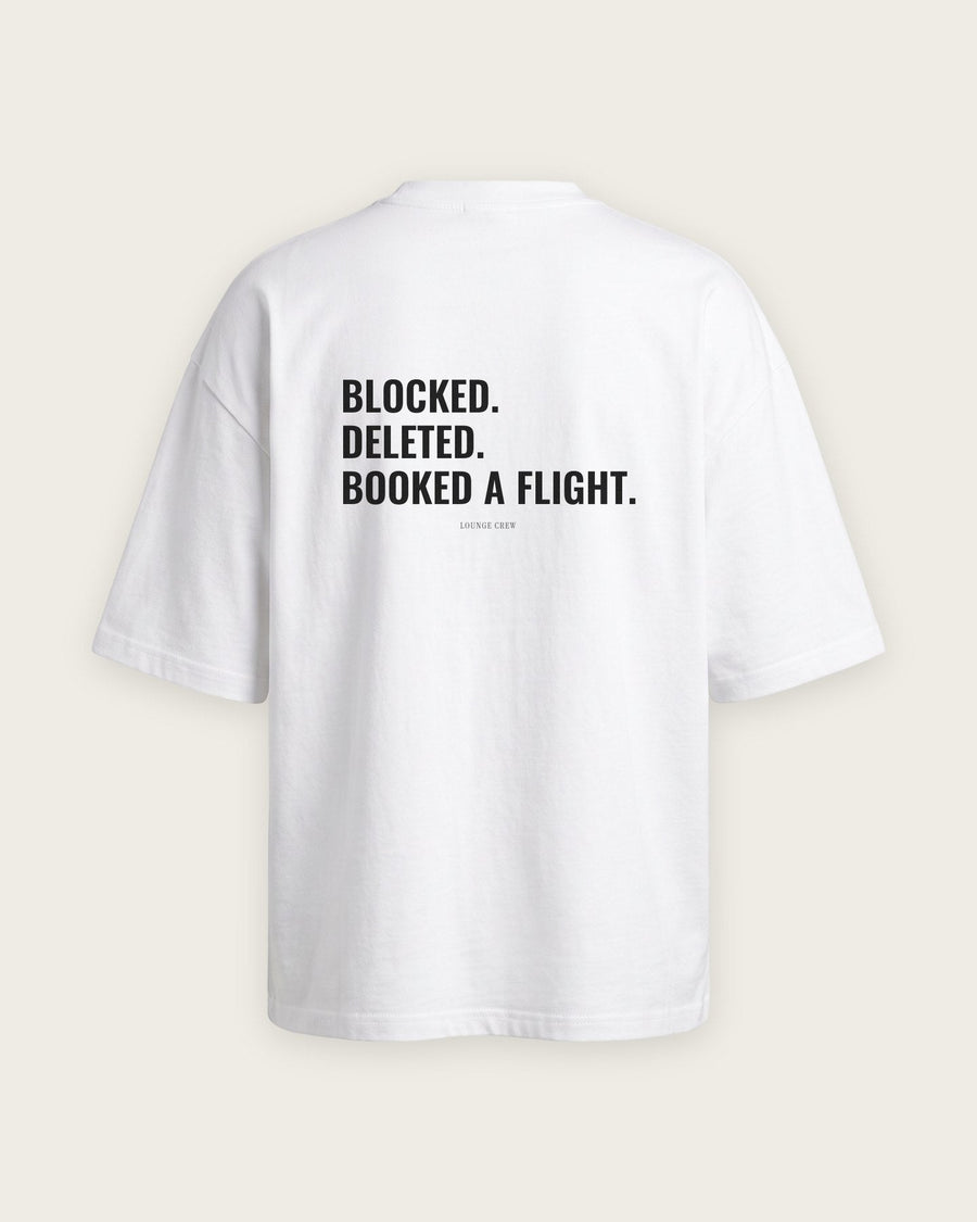 Camiseta Oversized “Blocked, Deleted, Booked a Flight”