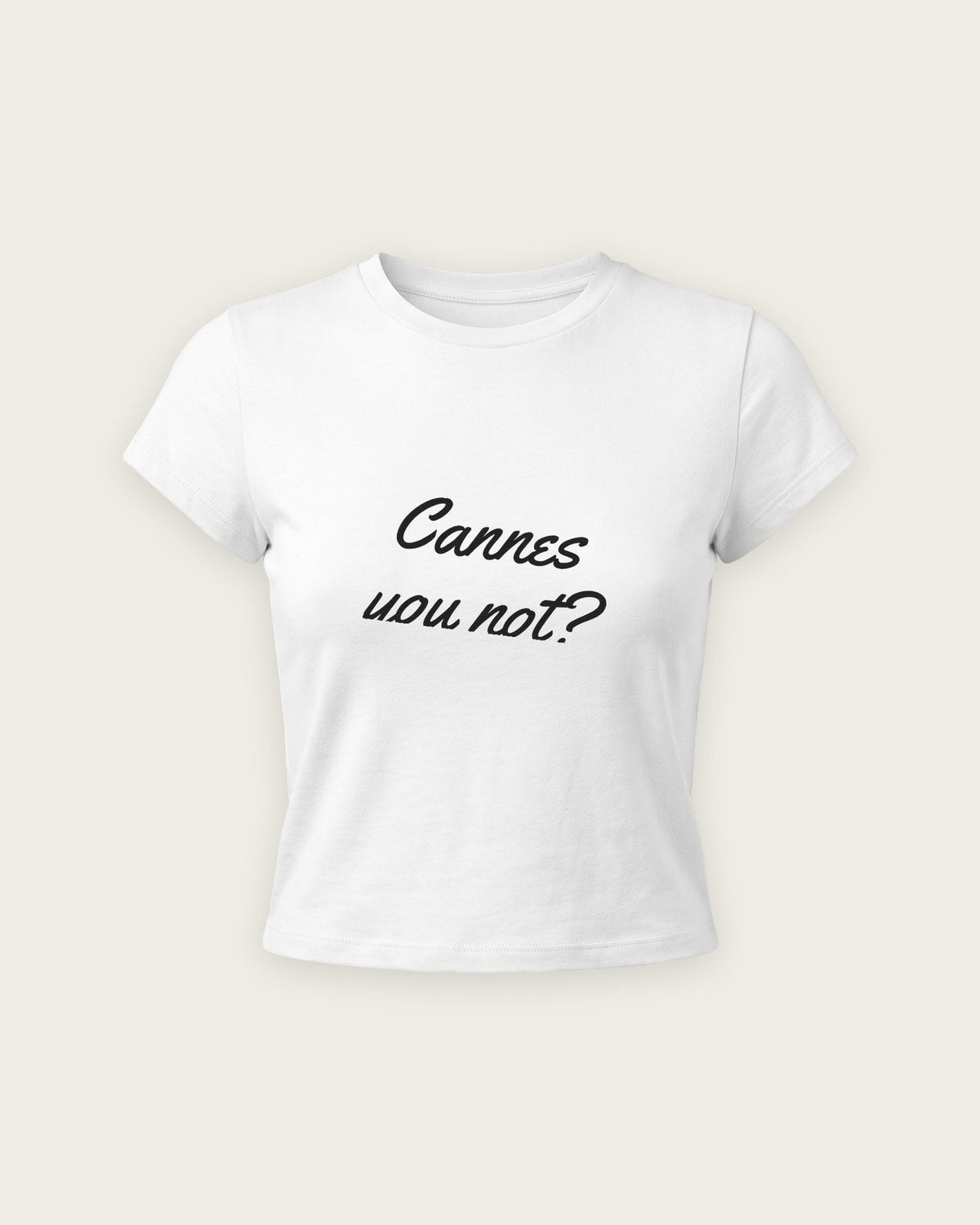 Baby Tee “Cannes You Not” — Branco